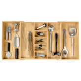 KitchenEdge adjustable drawer organizer for utensils in bamboo keeps utensils neatly separated.