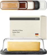 KIVY butter dish on black marble base with glass lid keeps butter clean and accessible.