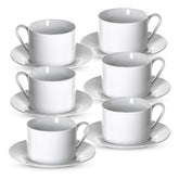 Klikel tea cups and saucers on table for elegant dining.