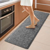 KMAT kitchen mat cushions feet for long cooking sessions.