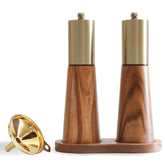 KOCHIRAKOSO gold salt and pepper grinder set on wood base enhances kitchen decor