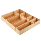 Kootek 8-piece bamboo drawer organizer set keeps utensils neatly separated for quick access.