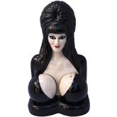 Kreepsville 666 Elvira salt and pepper shaker set on table, adds gothic flair to meals.