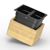 KYONANO coffee knock box with wood exterior and stainless steel liner for clean grounds disposal.