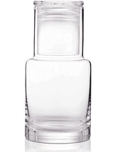 Lancici bedside carafe and glass set on a tidy nightstand for quick, spill-free water access.