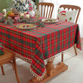Laolitou Christmas gingham tablecloth with red tassels for festive dining ambiance.