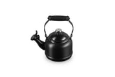 Le Creuset Demi Tea Kettle in Licorice — front view highlighting durable enamel and quick heating.