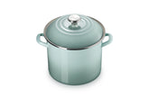 Le Creuset enamel steel stockpot exterior in Sea Salt heats quickly for soups.