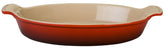 Le Creuset Heritage oval au gratin dish in Cerise showing even heat for thorough baking