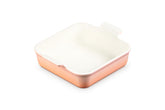 Le Creuset Heritage Square 3qt Peche top view highlights vibrant glaze for oven-to-table meals.