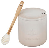 Le Creuset honey pot with silicone dipper for convenient countertop sweetness