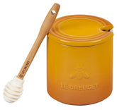 Le Creuset Nectar honey pot 14 oz with lid, perfect for slow drizzle in tea.