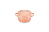 Le Creuset Peche mini cocotte with gold heart knob, ideal for gifting desserts.
