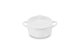 Le Creuset mini round cocotte white 14oz shows elegant individual servings for table presentation.
