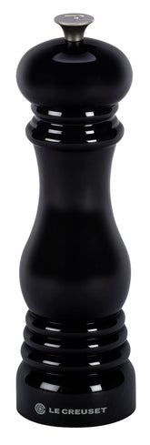 Le Creuset pepper mill 8in black with ceramic grinder for consistent pepper grinding.