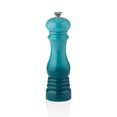Le Creuset Caribbean salt mill 8in body shows sleek, precise grinding ready for seasoning.