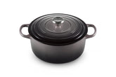Le Creuset Signature Round Dutch Oven Oyster exterior shows vibrant color and heat retention.
