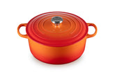 Le Creuset Signature Round Dutch Oven in flame with lid on, ideal for braising.