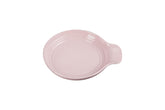Le Creuset spoon rest round 6-inch chiffon pink keeps counters clean.