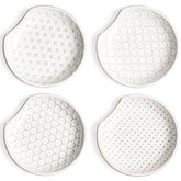 LE TAUCI spoon rest on stove top with embossed designs, catching drips and protecting counters