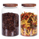 Leaves and Trees Y large glass jar set with airtight wooden lids for pantry organization.