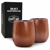 LEAVITT BAY COFFEE teak whiskey glass set of two on a bar, ideal for savoring.