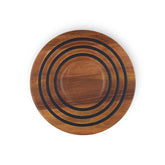 Le Creuset magnetic wooden trivet in acacia wood, heat-safe base for cookware.
