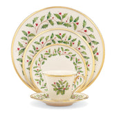Lenox Holiday dinner plate with holly motif and 24-karat gold trim for elegant holiday dining.