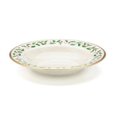 Lenox Holiday soup bowl with holly and berry motif adds festive elegance to meals.