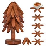 LIFETOWE wooden tree trivet set with five dark coasters protecting surfaces from hot dishes.