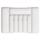 Lifewit silverware drawer organizer folded-compact stores utensils neatly in small drawers.