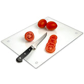 Light In The Dark tempered glass cutting board on a counter for precise food prep