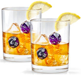 LIIGEMI old-fashioned glass with purple dice embedded elevates elegant whiskey sipping