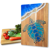 LILKUISYN acacia cutting board with blue resin wave for precise chopping.