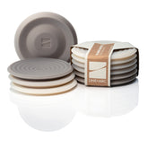 LINE+ARC Degrē sandstone coasters on a wood table protect surfaces with style.