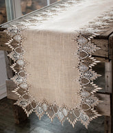 Linens, Art and Things lace runner neutral earth tones enhances a sophisticated dinner table.