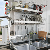 LIVOD over-sink dish rack top layer storage keeps pots and lids organized above the counter.