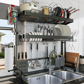 LIVOD over-the-sink rack top layer keeps pots and cups neatly organized.
