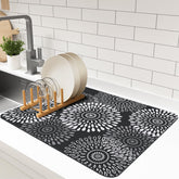 LuxStep dish drying mat absorbs moisture for dry countertops after washing dishes.
