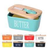Lxmons ceramic butter dish with wooden lid keeps butter fresh on the counter.