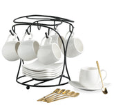 LYEOBOH espresso cups with saucers set shown in a neat, modern kitchen.