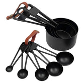 LYFJXX black stainless-steel measuring cups set nested for compact storage and durability.
