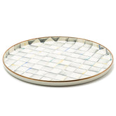 MacKenzie-Childs enamel round tray with Sterling Check for elegant entertaining.