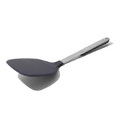 Made In Harbour Blue rubber spatula head closeup for gentle nonstick flipping.