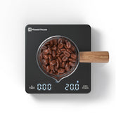 Maestri House Mini Coffee Scale in palm size for precise espresso measurement.
