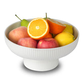Magclay fruit bowl with drainage hole showing fresh fruit and water drainage