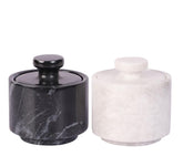 Marble Hives salt cellars with lids on a clean counter for easy seasoning access.