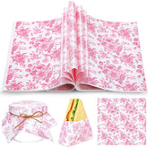 Marspark floral wax paper in pink provides greaseproof wrapping for sandwiches.