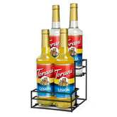 MCSAPIL coffee syrup rack on countertop with four bottles for easy flavor access.