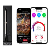 Meater SE probe in hand delivering precise temperature readings for cooking.